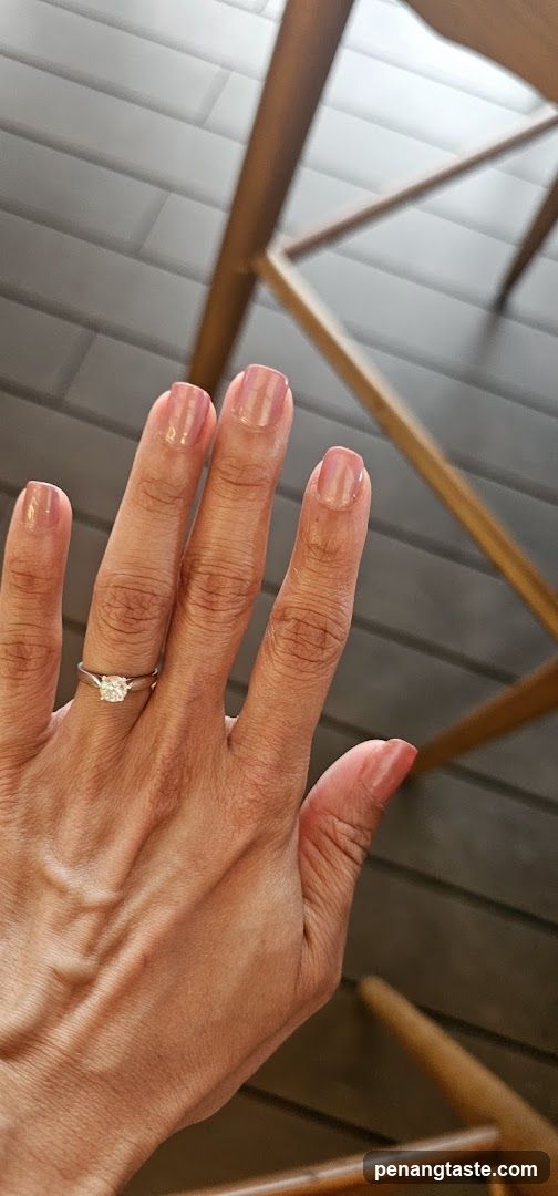 Hand with Ring and Manicure