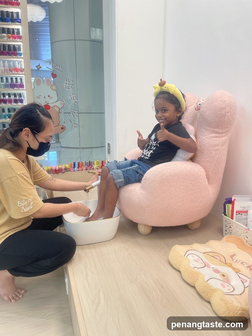 Child receiving a pedicure