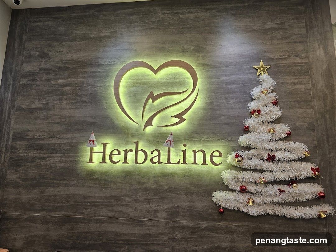 Herbaline Logo with Christmas Tree Decoration