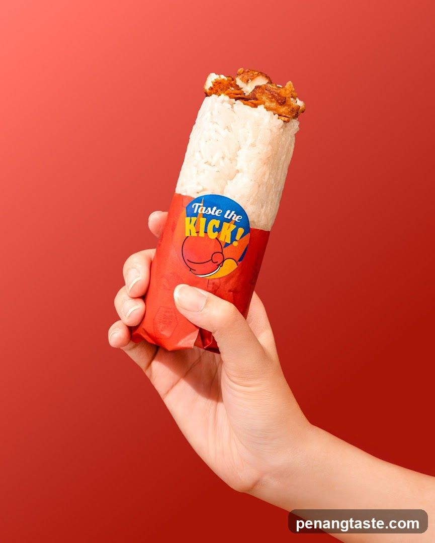 Hand holding a wrapped food item
