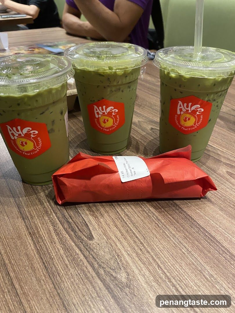 Table with beverages and wrapped food
