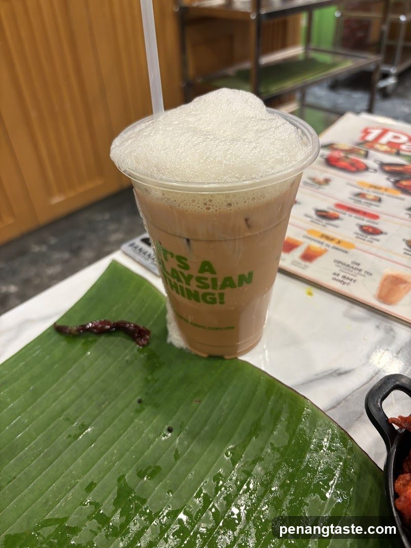 Iced beverage on banana leaf