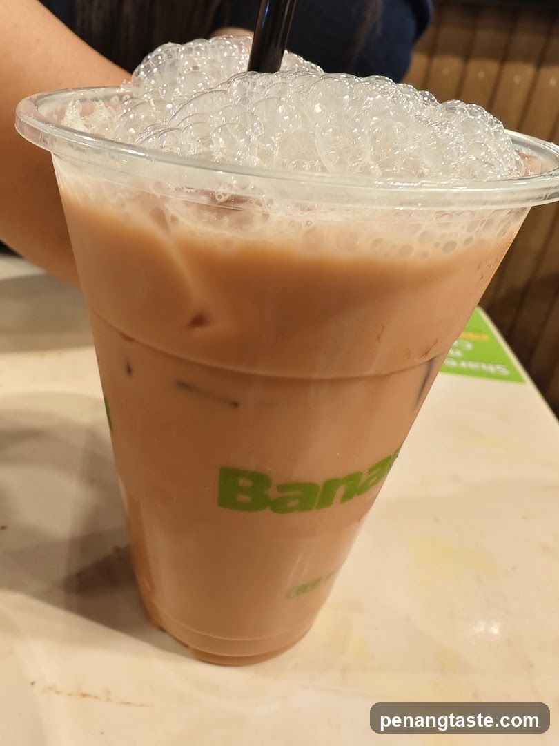Iced beverage in plastic cup