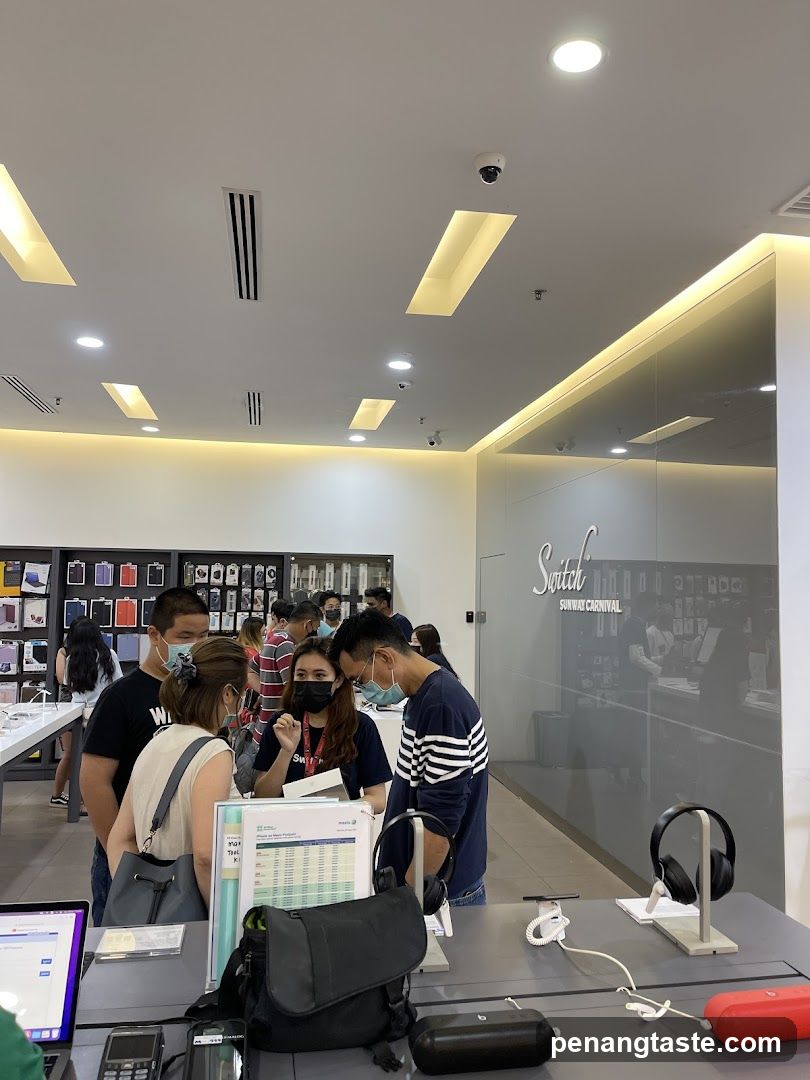 Store Interior with Customers and Staff