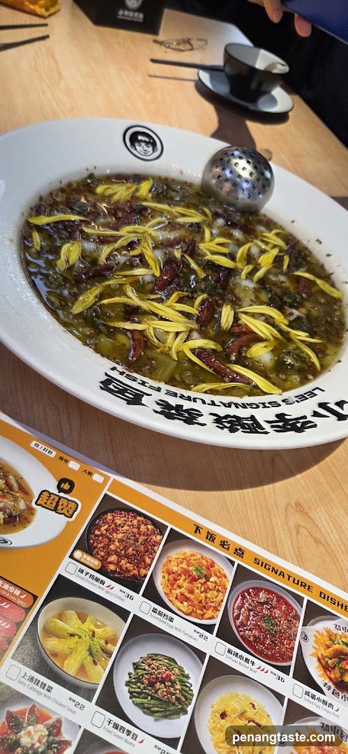 Dish with pickled vegetables and yellow garnish