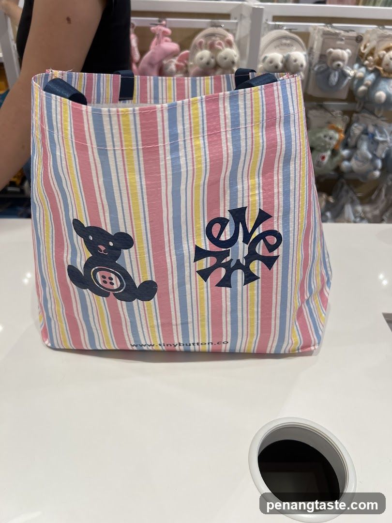 Striped tote bag with teddy bear design