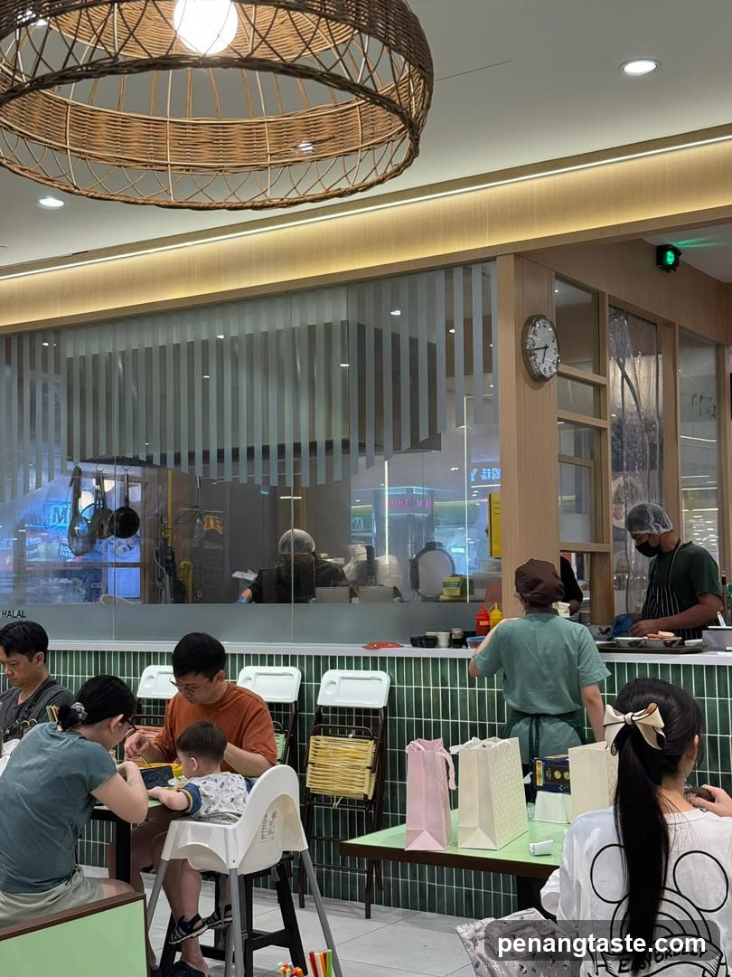Dining Area with Staff and Customers