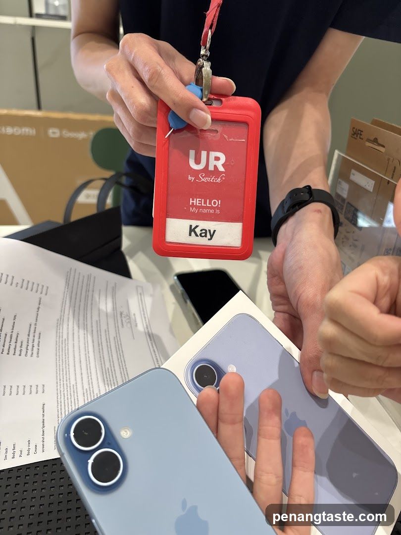 UR by Switch Staff Member Holding ID Badge