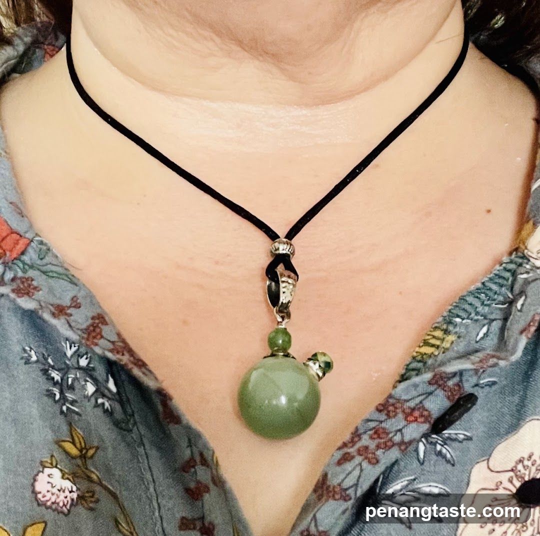 Person wearing necklace