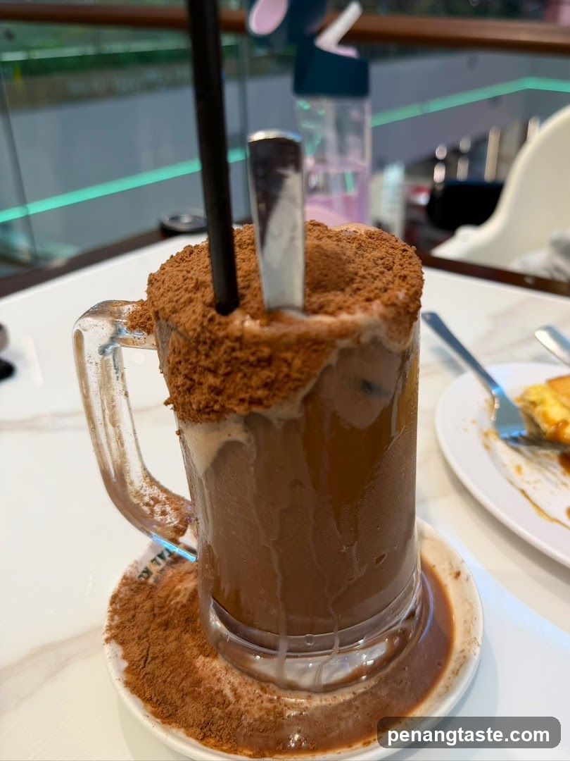 Chocolate beverage with cinnamon topping