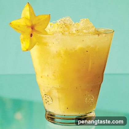 Tropical Drink with Starfruit Garnish