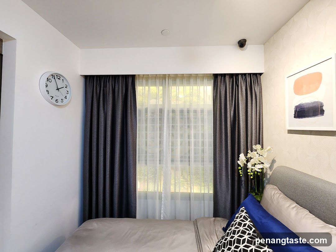 Bedroom Interior with Curtains and Wall Clock