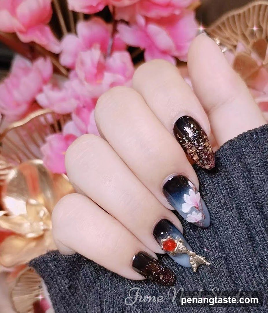 Nail Art Design with Floral and Glitter Accents