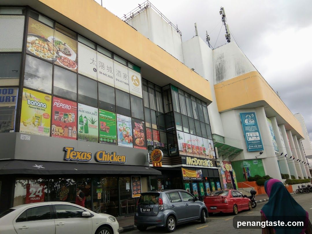 Commercial building facade with multiple storefronts