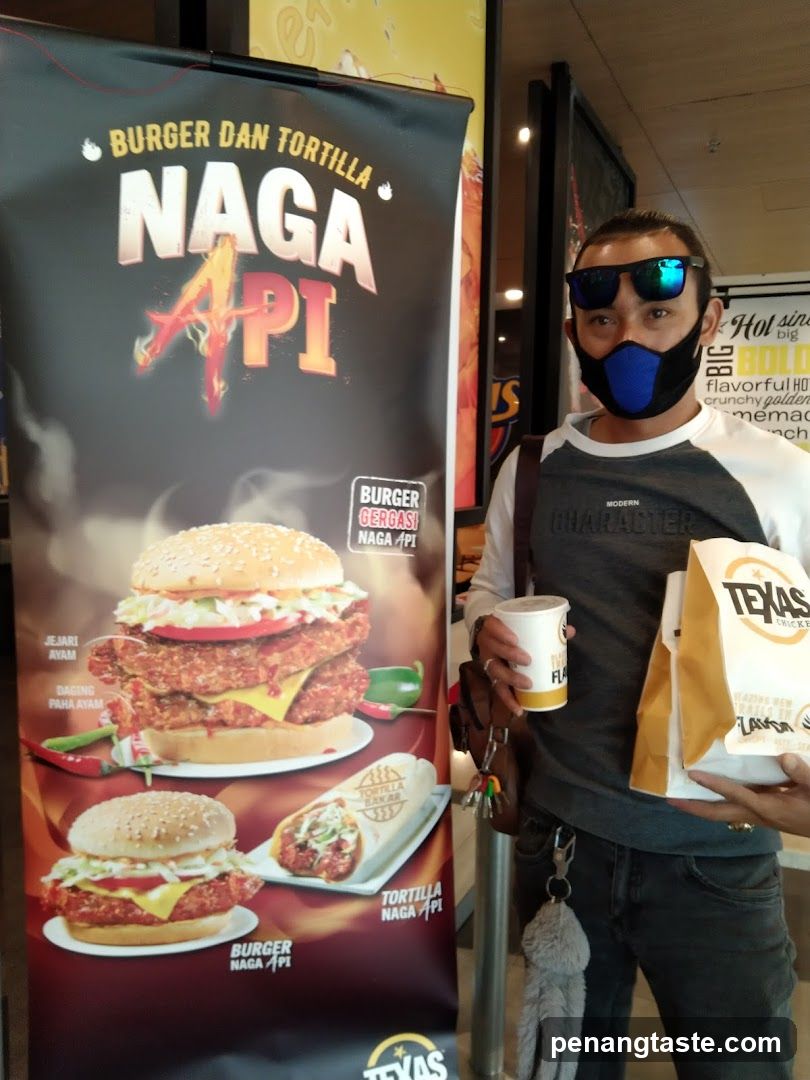 Customer with Texas Chicken branded merchandise