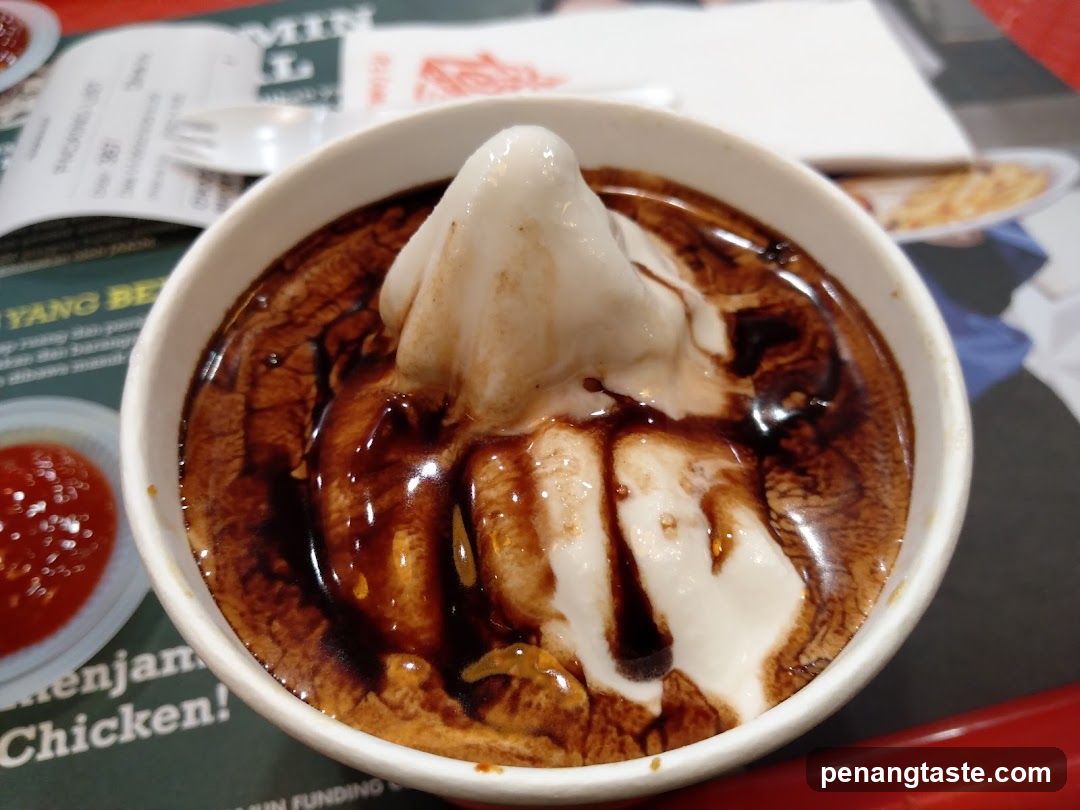 Ice cream dessert with chocolate sauce