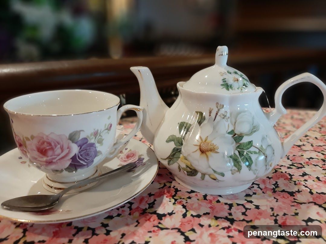 Tea Set on Floral Tablecloth