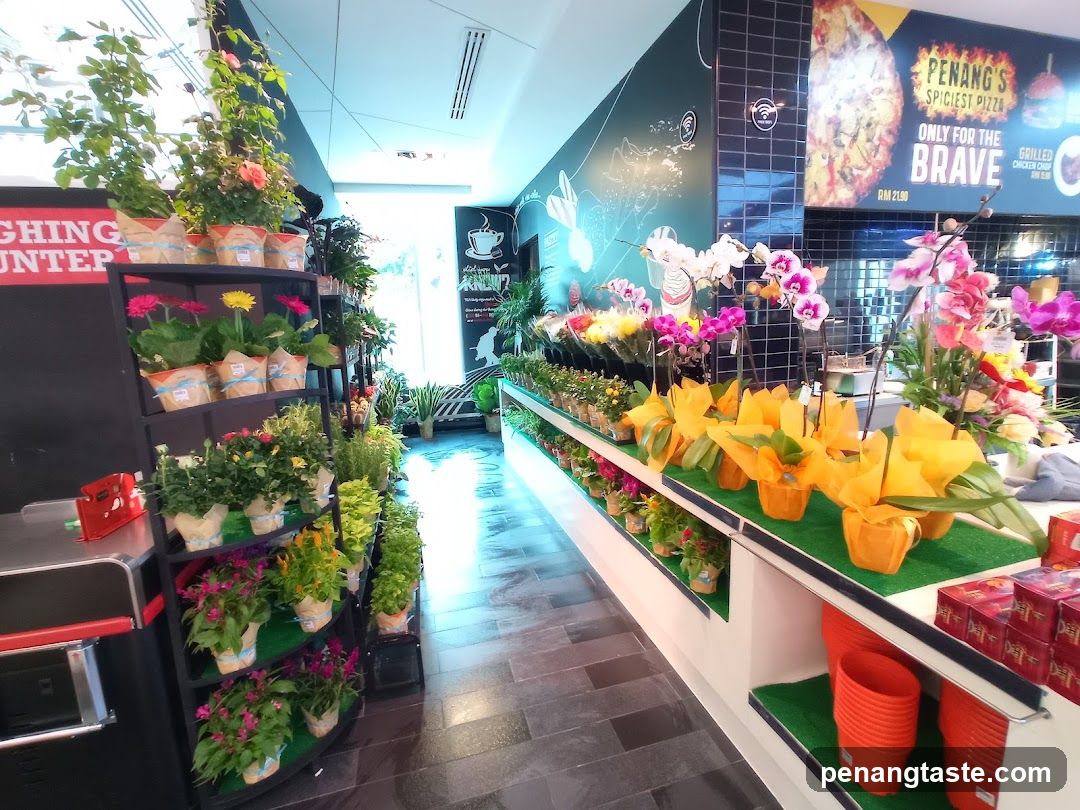 Interior floral shop with pizza advertisement