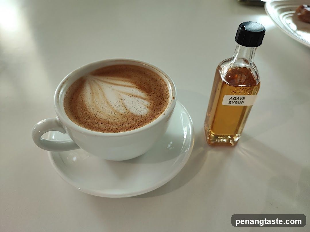 Coffee and Agave Syrup on Table