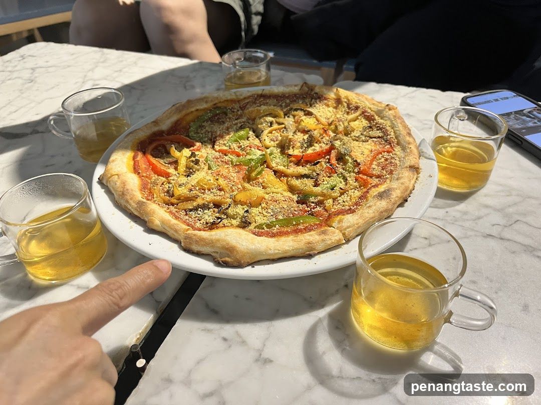 Pizza and beverages at a café