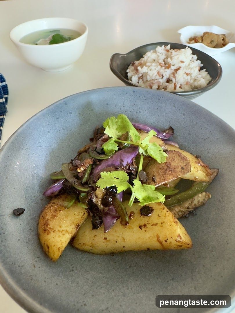 Dinner Plate with Stir-Fried Potatoes and Vegetables