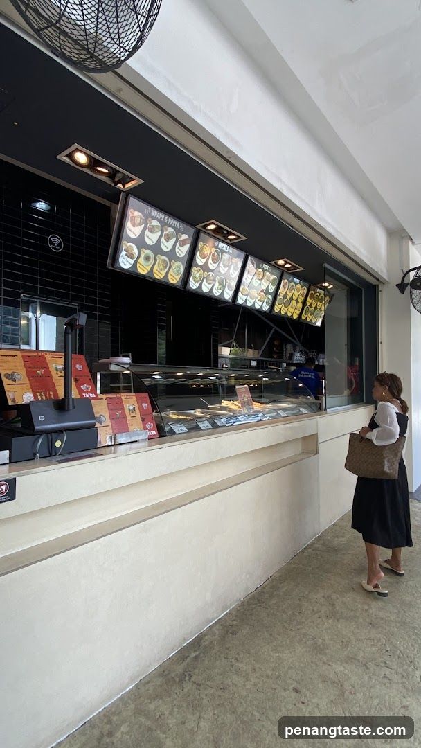 Customer at food counter