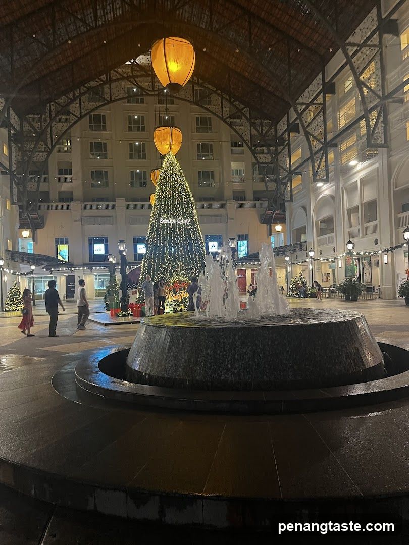Indoor shopping mall atrium at night