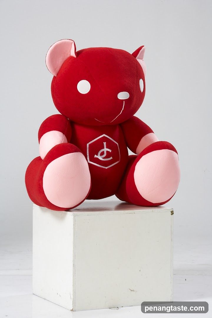 Red plush bear toy