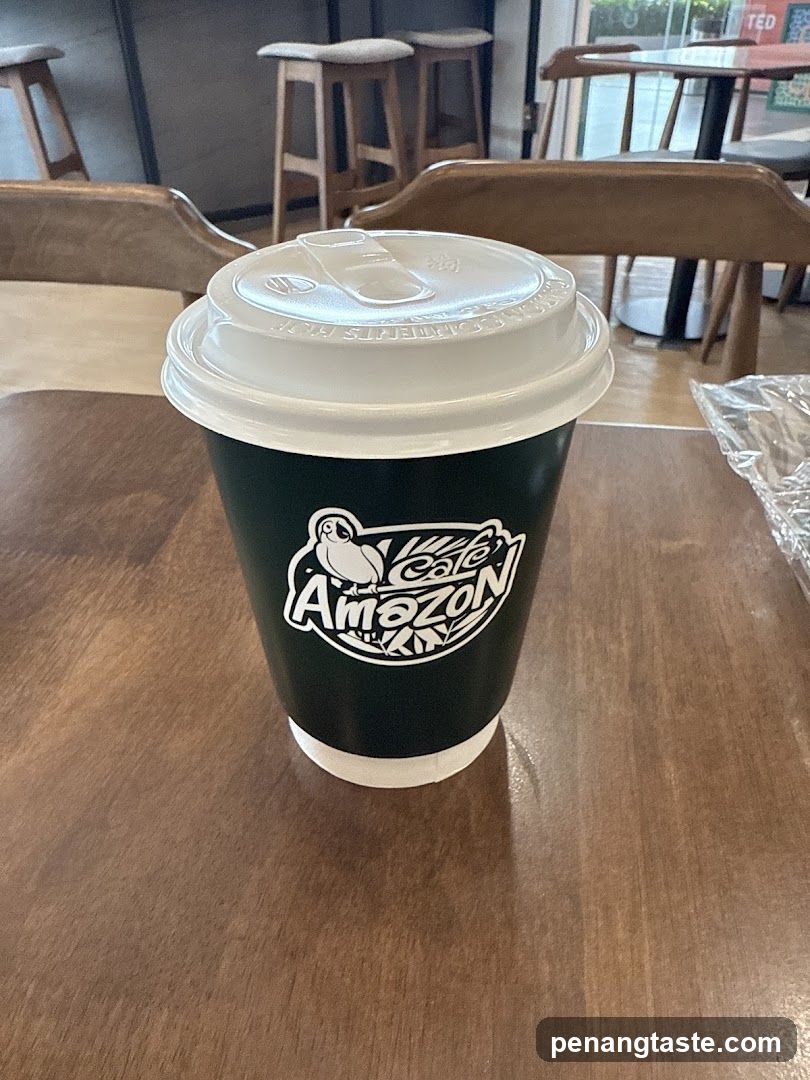 Café Amazon Cup on Table