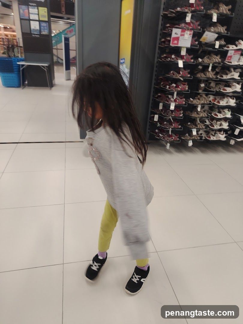 Child in Shoe Store