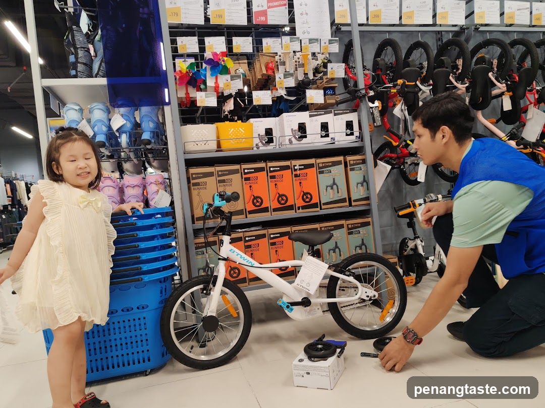 Bike Shop Interior with Child and Staff