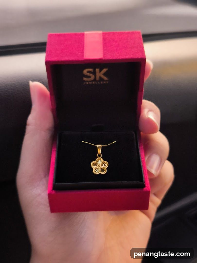 Hand holding jewelry box
