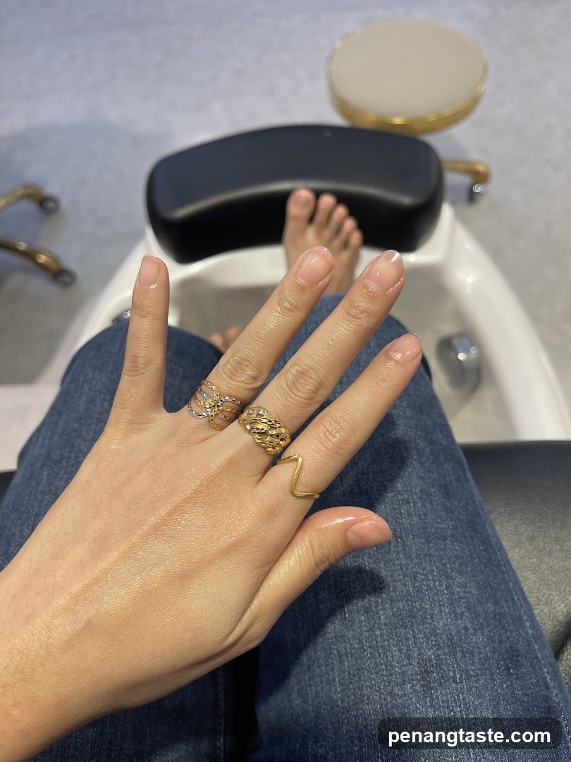 Hand with Rings in Foot Spa Setting