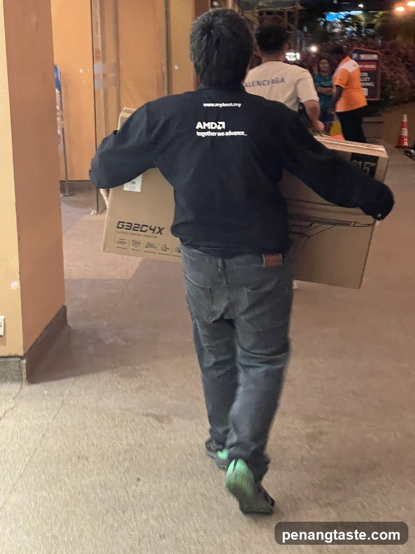 Person carrying boxes