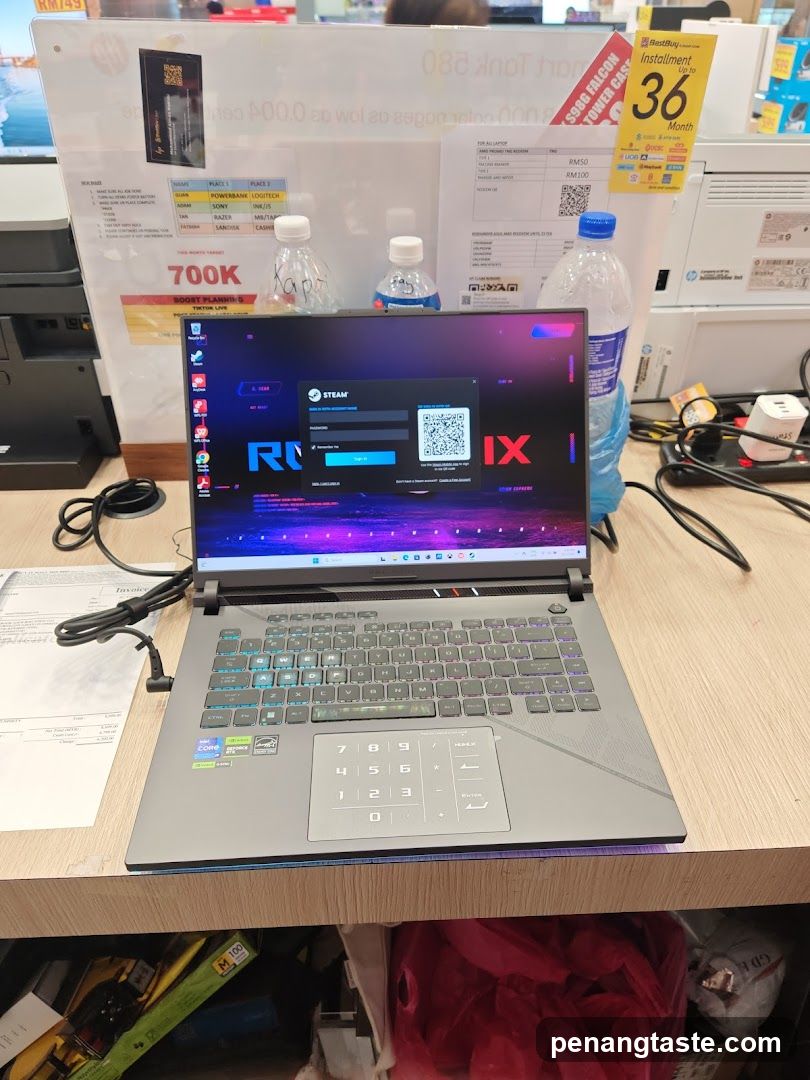 Laptop Displaying Steam Login Screen