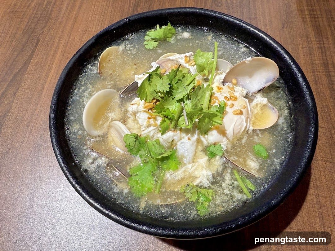Clam Soup in Black Bowl