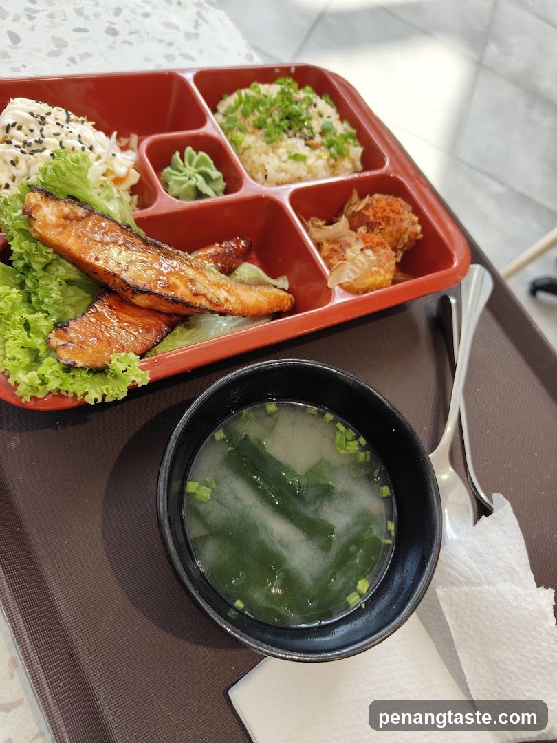 Meal served in a bento box with soup