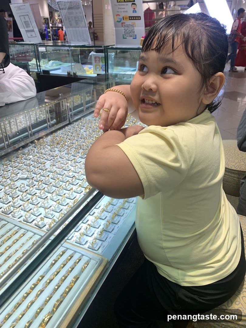 Child in jewelry store
