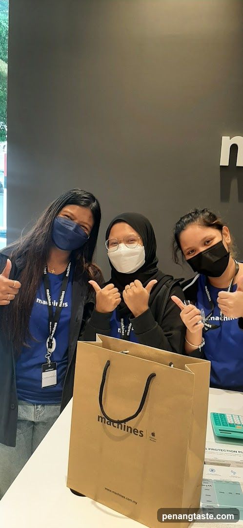 Staff at retail counter
