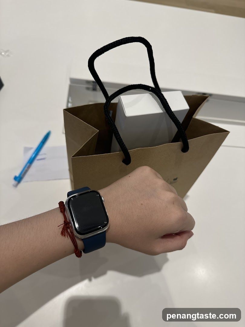 Hand with Apple Watch and Shopping Bag