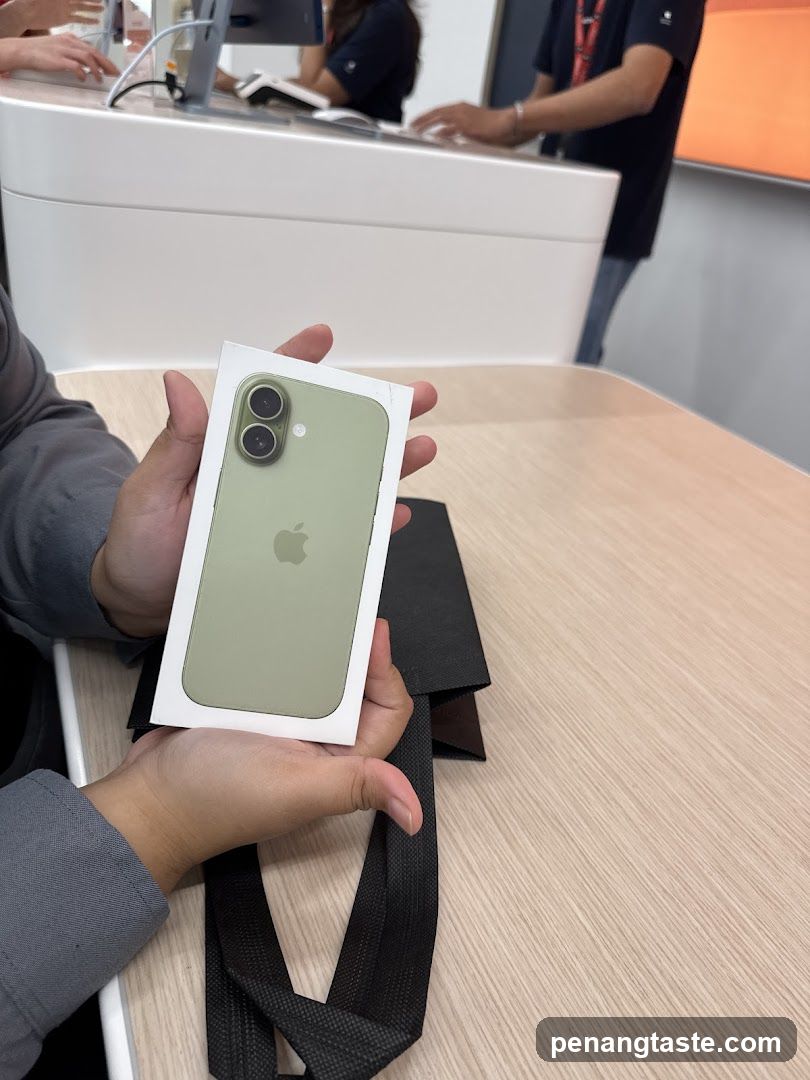 Customer holding iPhone in store
