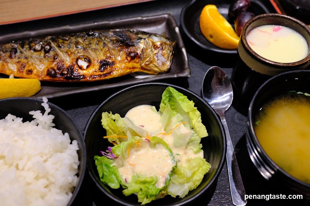 Japanese meal served on black plates