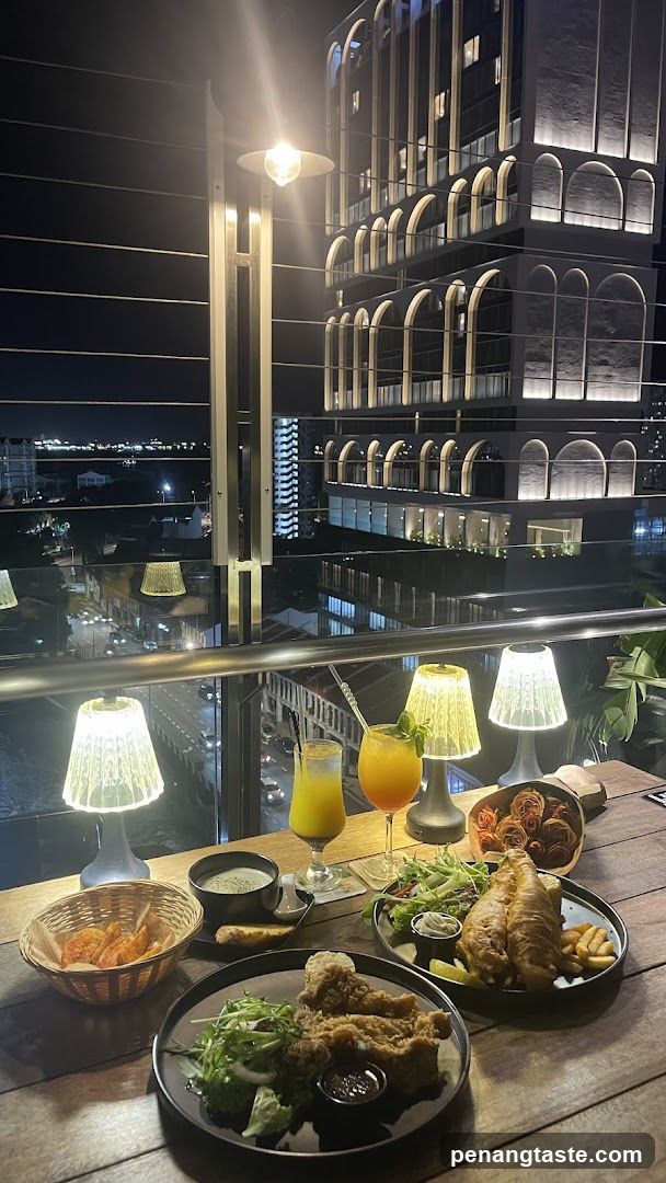 Nighttime Rooftop Dining View