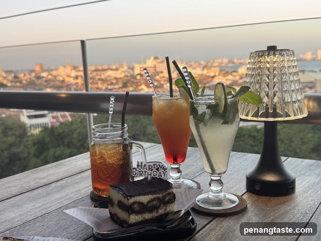 Table with drinks and dessert on balcony