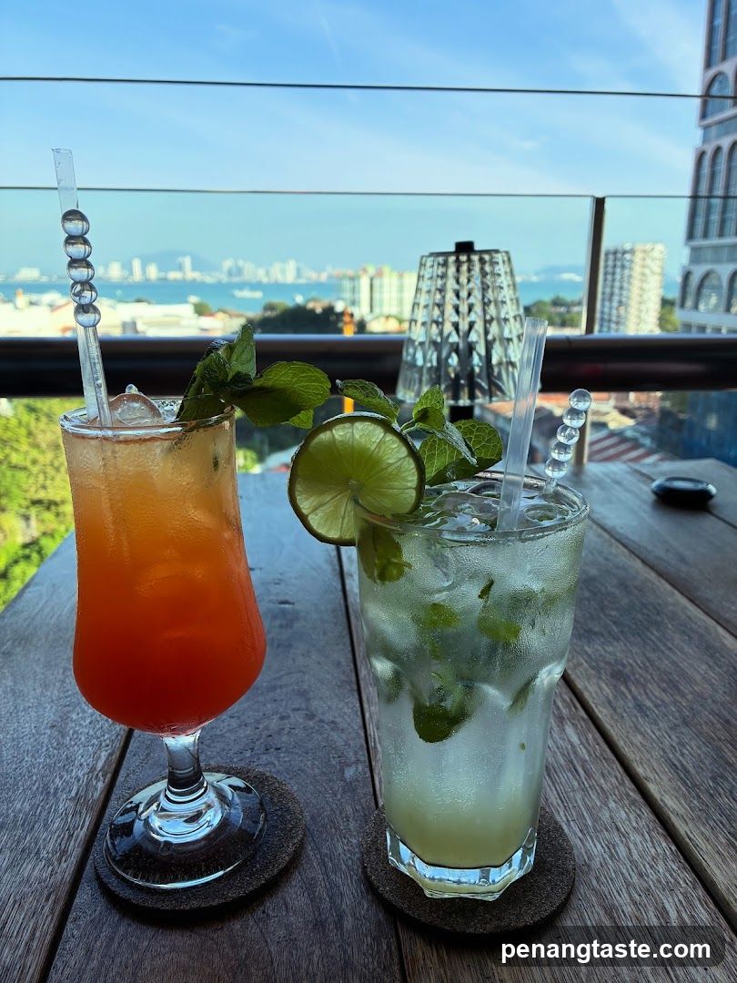 Two cocktails on a rooftop terrace