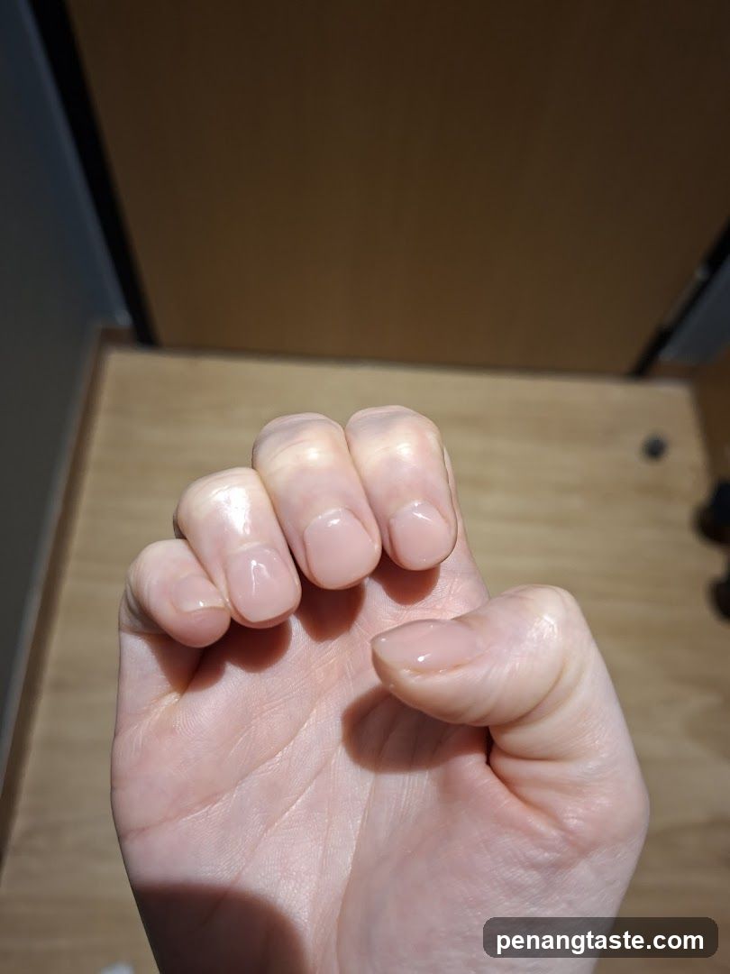 Hand with manicured nails