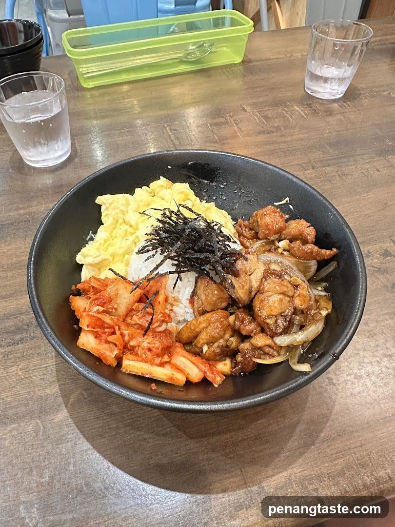 Bowl of rice dish on wooden table