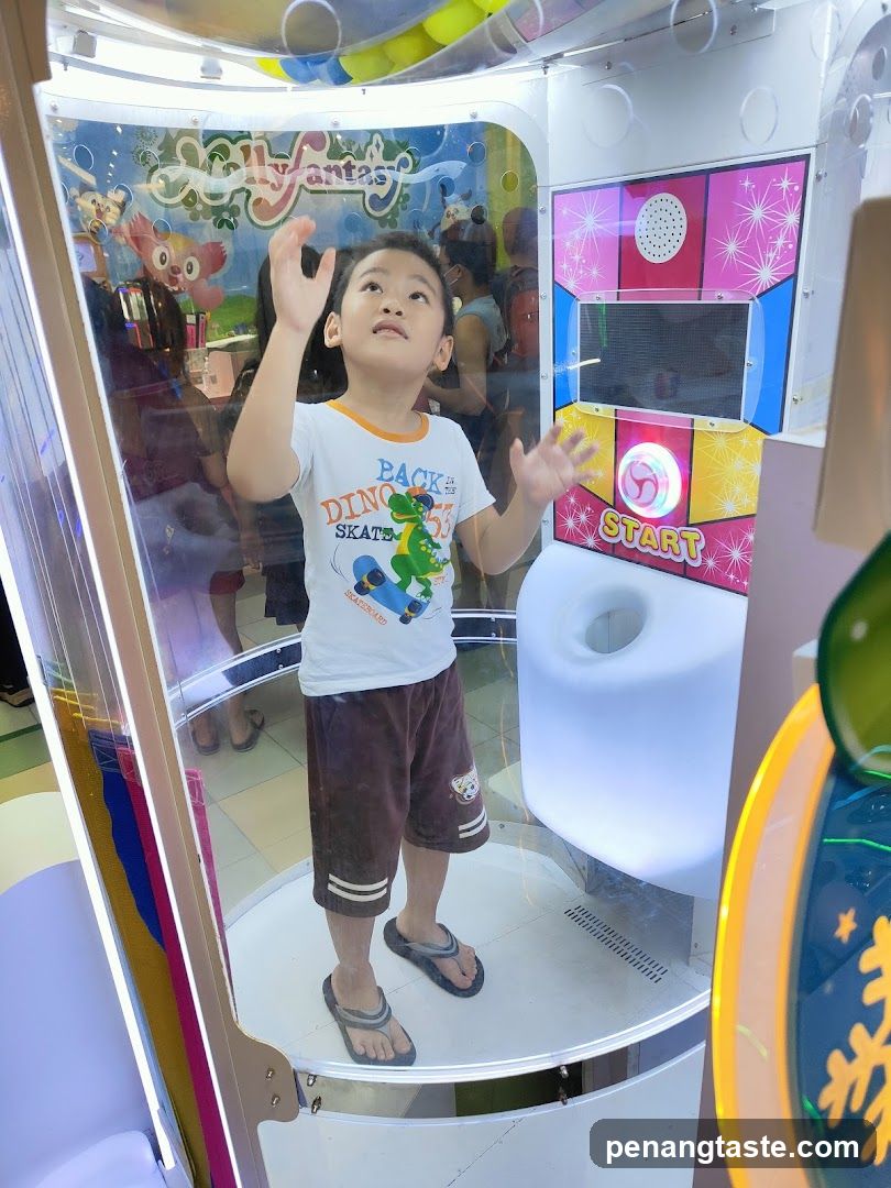 Child in arcade machine
