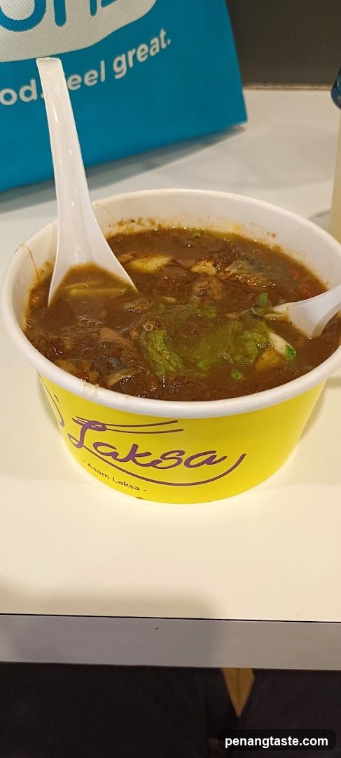 Asam Laksa in a yellow cup