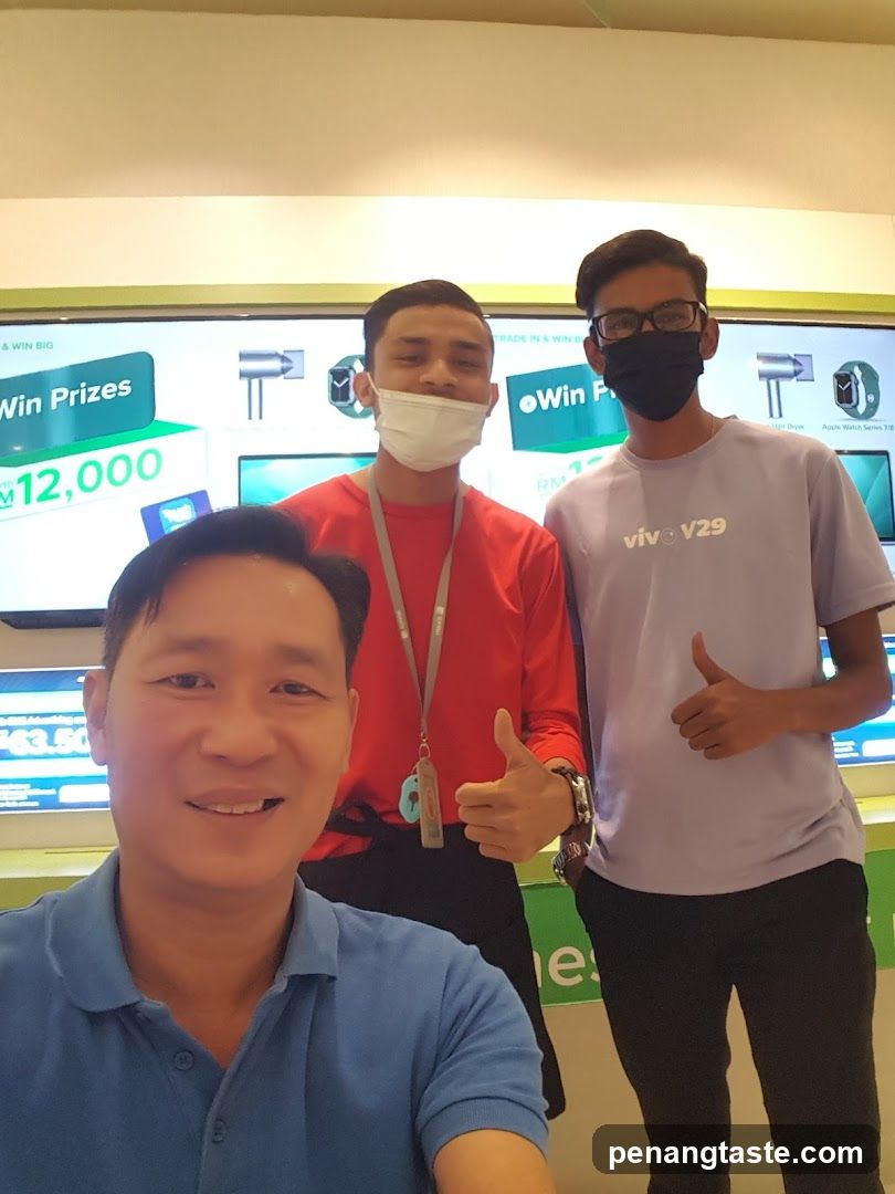 Group selfie inside a store